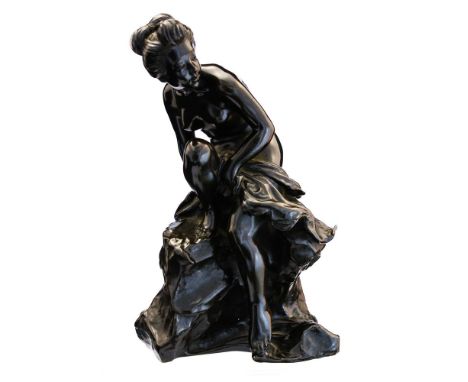 A Japanese bronze study of a female nude upon a rock, Meiji period, 1868-1912, all-over dark brown patina, impressed seal sig