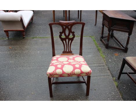 A George III mahogany side chair, circa 1770, in the manner of Thomas Chippendale, the back with a shaped crest rail and pier