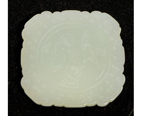 A Chinese pale jade bi, one side carved with scrolls, the reverse with birds and a flower, 6cm by 6cm