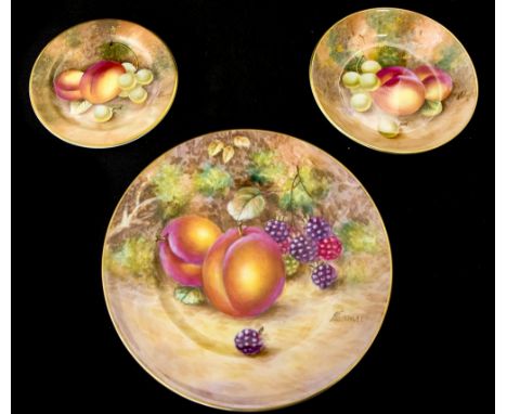 A Royal Worcester fruit painted tea plate by Freeman, together with two similar trinket dishes, signed indistinctly, plate 15
