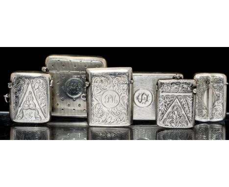 A collection of six Edwardian vesta cases, two larger on with engine turned decoration, Walker & Hall, Chester, 1908 &  Horto