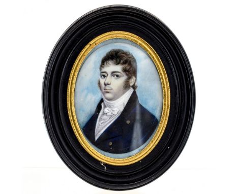 A mid 19th Century oval portrait miniature on ivory of a gentleman, circa 1840, half length wearing a blue jacket, framed, 7c