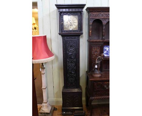 Carved oak triple weight longcase clock having square brass dial inscribed R. Bullock, Ellesmere