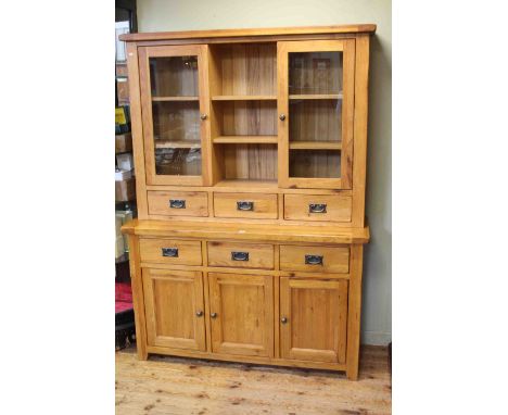 Golden oak dresser, the glazed door shelf back with three drawers above a base of three drawers with three cupboard doors bel