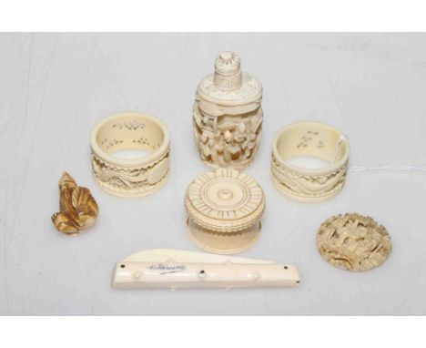 Ivory napkin rings, snuff box, netsuke and fruit knife