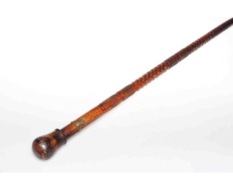 Wooden walking stick with Nazi emblem