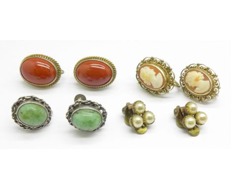 A pair of .800 silver cameo earrings, a pair of pearl earrings, a pair of silver and green stone earrings and a pair of corne