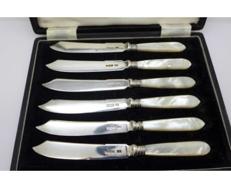 A set of six silver and mother of pearl dessert knives, Walker &amp; Hall