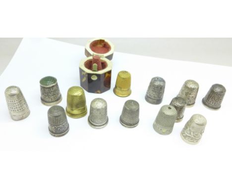 Eleven silver and three other thimbles and a tortoiseshell thimble holder