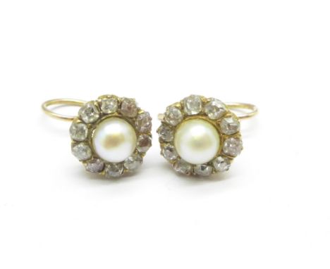 A pair of old cut diamond and pearl earrings set in yellow metal