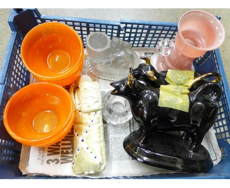 Two Jackfield cow creamers, two Victorian glass watch strikers, four orange glass bowls marked Daum, a pink glass hyacinth va