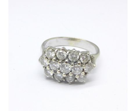 A white metal set, three row diamond ring, 4.4g, K