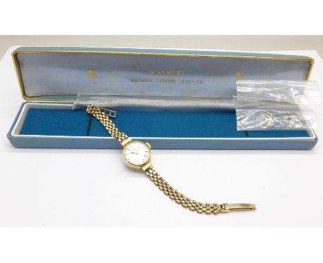 A 9ct gold Rotary wristwatch with spare link, 15.7g with movement
