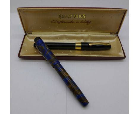 A Sheaffer snorkel pen with 14k gold nib, cased, and a marbelled Summit Robot pen with 14k gold nib lacking lever