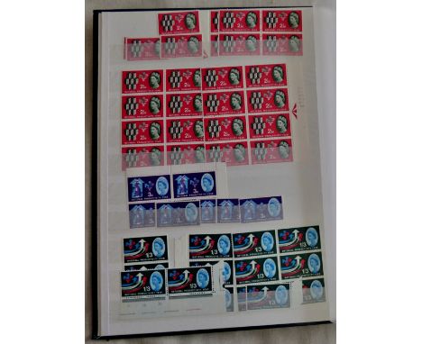 Great Britain (Wholesale) 1953 - 1970's mint u/m stock of mostly sets in a large stock book mostly in blocks 4 or 6 - good lo