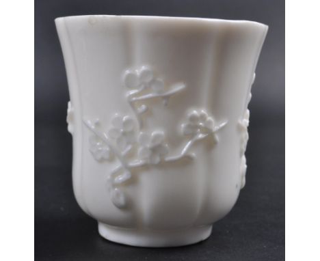 A 18th century Blanc de Chine' porcelain tea / wine cup made in Dehua, China. A soft paste porcelain tea bowl decorated in re