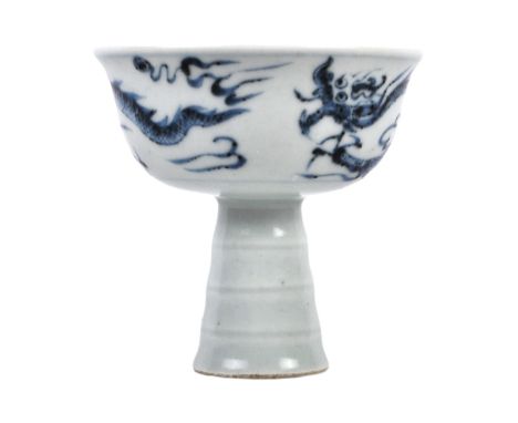 A 20th Century Chinese blue &amp; white porcelain footed pedestal bowl. Hand painted decoration depicting dragons to he exter