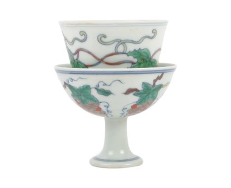 Two pieces of 20th Century Chinese Republic period porcelain comprising a footed bowl and tea bowl both decorated with grape 