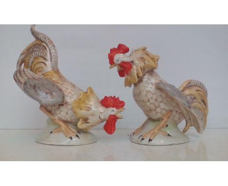A Pair of Early Ceramic Cockerels