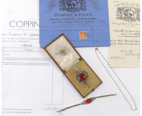 Edwardian fire opal (20 x 15mm) and diamond pendant with detachable brooch fitting, set with fifty-five diamonds in a floral 