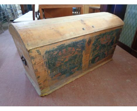A 19th century hand painted pine dome topped shipping trunk 