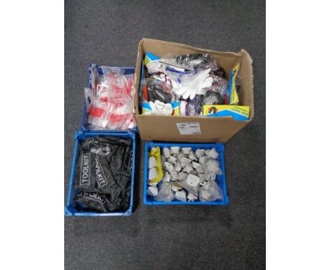 Two crates of ear defenders, tools, gloves, safety glasses, travel adaptors etc 