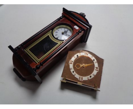 A wall clock and a mid 20th century copper mirrored mantel clock 