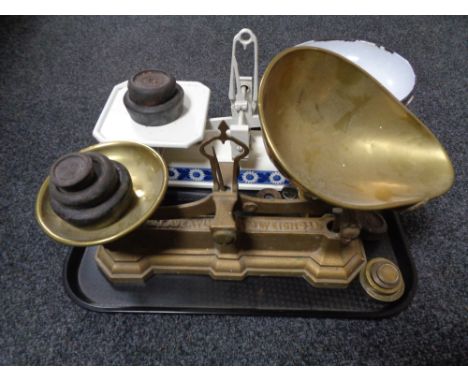A tray of two sets of vintage scales and weights 