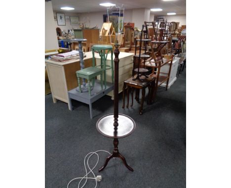 A stained beech wood standard lamp/wine table 