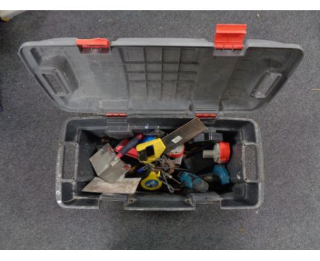 A large plastic tool box of assorted hand tools, Makita drill, spirit level, 30 m measure etc 