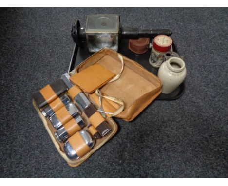 A tray of leather travel set, hip flask, vintage coach lamp, carbide lamp etc 