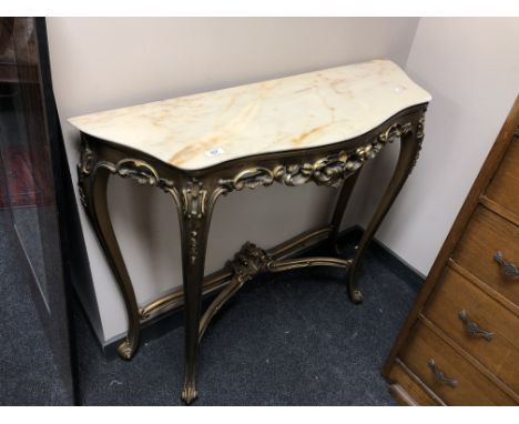 A shaped, gilt and marble topped console table 