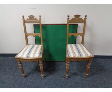 A pair of early 20th century oak bedroom chairs and a card table