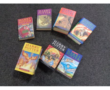 A crate of seven Harry Potter volumes 
