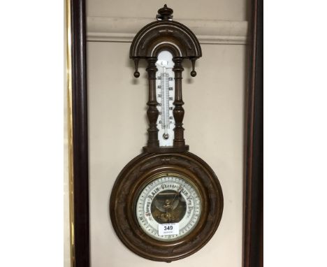 An Edwardian barometer with circular enamelled dial 