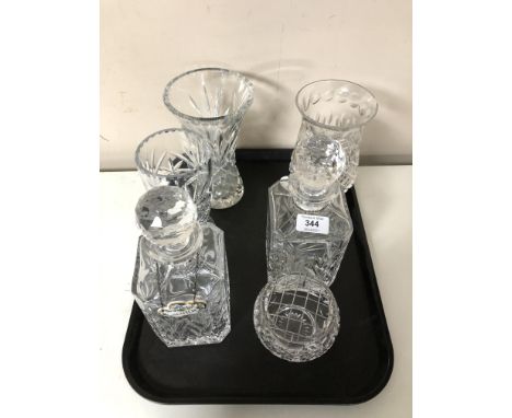 A pair of heavy cut-glass decanters, with stoppers, with two Coalport ceramic decanter labels "BRANDY" and "SCOTCH", as well 