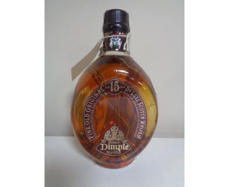 A bottle of Dimple The Old Original 15 years deluxe Scotch Whisky, 70 cl, sealed  