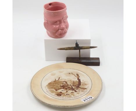 WWI period Grimwades (Staffordshire) 'Old Bill' plate and character jug (plate with cracks), with a trench art model of U-96,