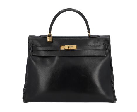 HERMÈS VINTAGE Handtasche "KELLY BAG 35". Koll. 1946. Box Leder in Schwarz mit vergoldeter Hardware. Klassisches Modell mit S