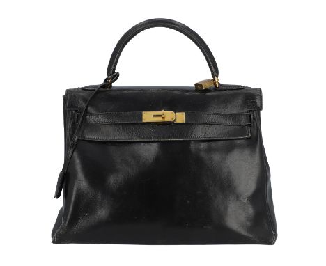 HERMÈS VINTAGE Handtasche "KELLY BAG 32". Koll. 1958. Box Leder in Schwarz mit vergoldeter Hardware. Klassisches Modell mit S