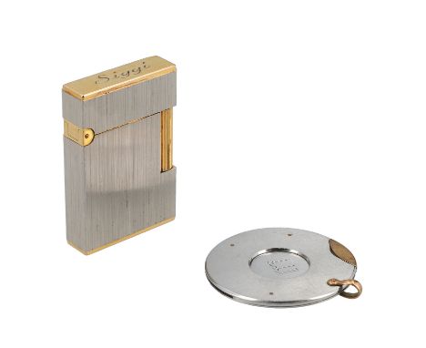 DUNHILL und S.T. DUPONT Konvolut. Feuerzeug und Zigarrenschneider in Bicolor. Box jeweils anbei. Gebrauchsspuren vorhanden. |