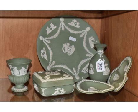 SIX PIECES OF WEDGWOOD JASPERWARE, in sage green, comprising a bud vase, a small urn style vase, a plate, a square trinket bo