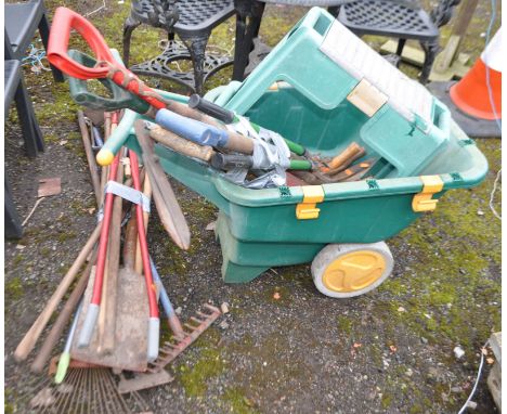 A PLASTIC WHEELBARROW AND A QUANTITY OF GARDEN TOOLS, including edging shears, spades, forks, an aluminium step ladder etc (2