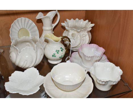 ELEVEN PIECES OF BELLEEK PORCELAIN, comprising two small jardinieres, three teacups and saucers (one saucer non-matching, all