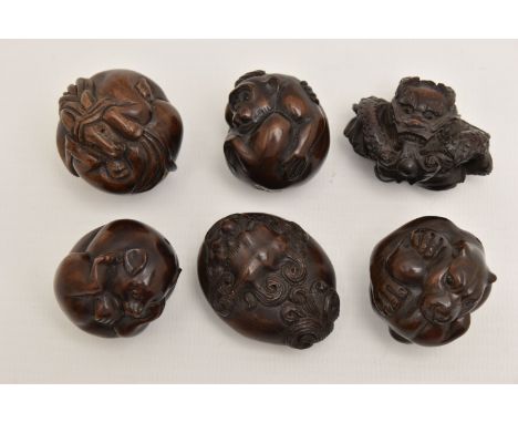 AN ASSORTMENT OF NETSUKE, six carved netsuke, depicting a panther, a dragon head, a dog, a monkey, a horse, and an entwined d