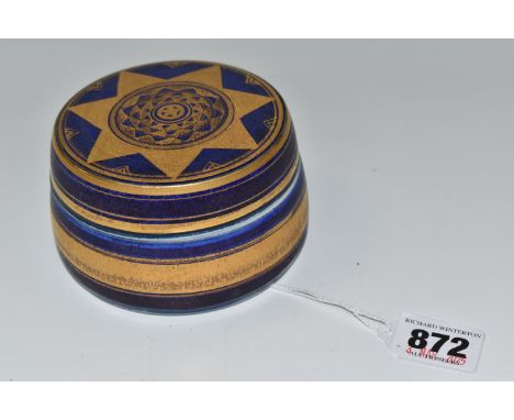 MARY RICH (1940-2022) A PORCELAIN COVERED TRINKET BOX, of tapering cylindrical form, decorated with gilt bands and a star mot
