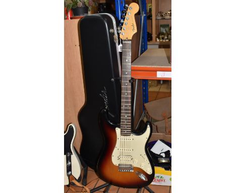A 2004 FENDER STRATOCASTER ELECTRIC GUITAR, AM DLX HSS RW 3TS American Deluxe, with a DH-1 humbucking pick-up and S1 switchin