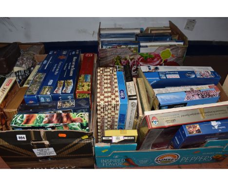 THREE BOXES OF VINTAGE JIGSAW PUZZLES, to include approximately thirty boxed jigsaw puzzles, mostly five hundred pieces from 