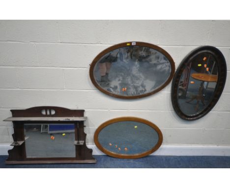 AN OVAL MAHOGANY BEVELLED EDGE WALL MIRROR, 83cm x 58cm, two other oval mirrors, along with another mirror with shelves, cond