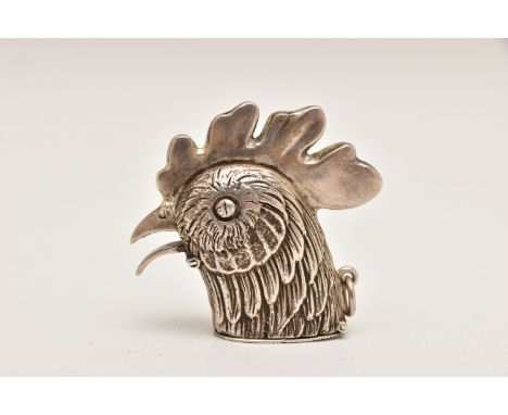 A WHITE METAL NOVELTY VESTA CASE, in the form of a cockerel, striker to the hinged base, fitted with a jump ring for suspensi